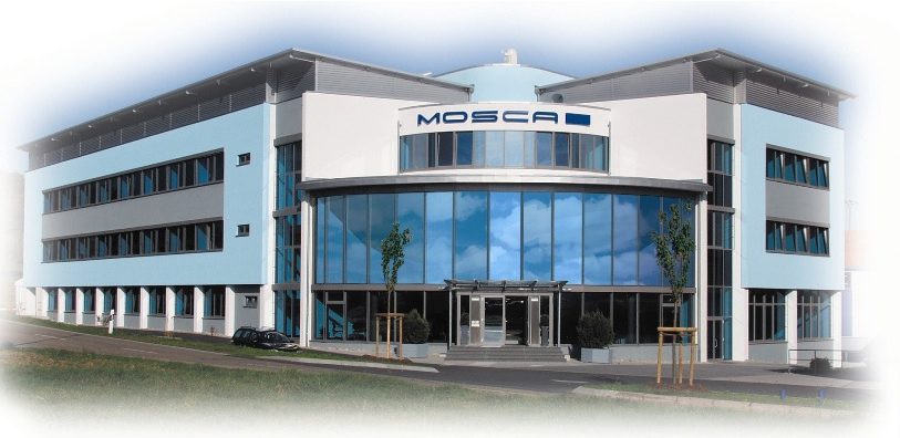 1983 ließ Firmengründer Gerd Mosca das erste Werk in Waldbrunn bauen; 2005 wurde das Produktionsgelände um 8.000 m2 Hallenfläche erweitert. Hier hat das Unternehmen heute seinen Hauptsitz.
