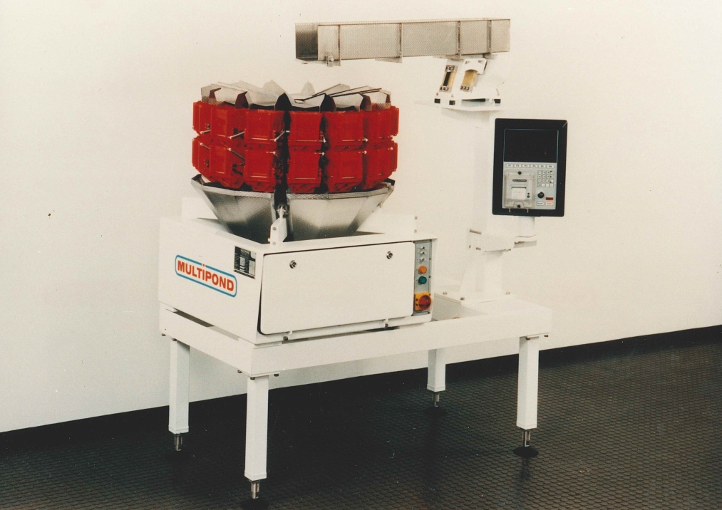 Die roten Kunststoffbehälter werden schnell zum Erkennungszeichen von Multipond. Der Typ MP 1401-B war 1993 kleinste Waage des Herstellers.