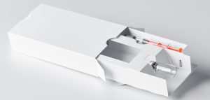 Faltschachtel mit Schiebemechanismus mit Innenkammern für verschiedene Applikationsmaterialien, wie z. B. Spritzen, Vials, Ampullen, Beutel