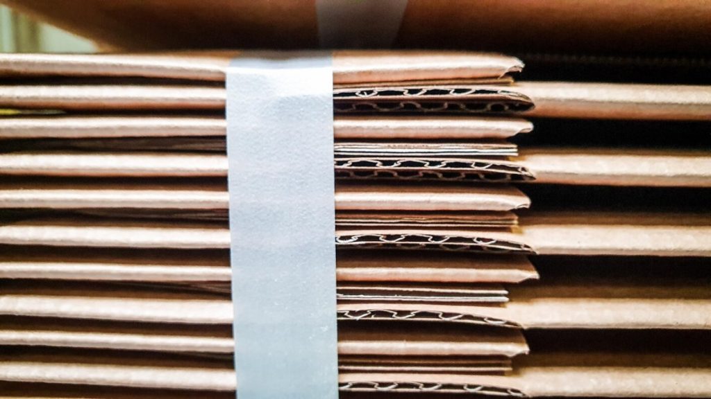 Stacked flat cardboard blanks made of paper at Klingele