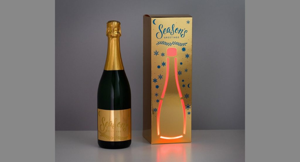 Champagner Verpackung leuchtet durch gedruckte Elektronik