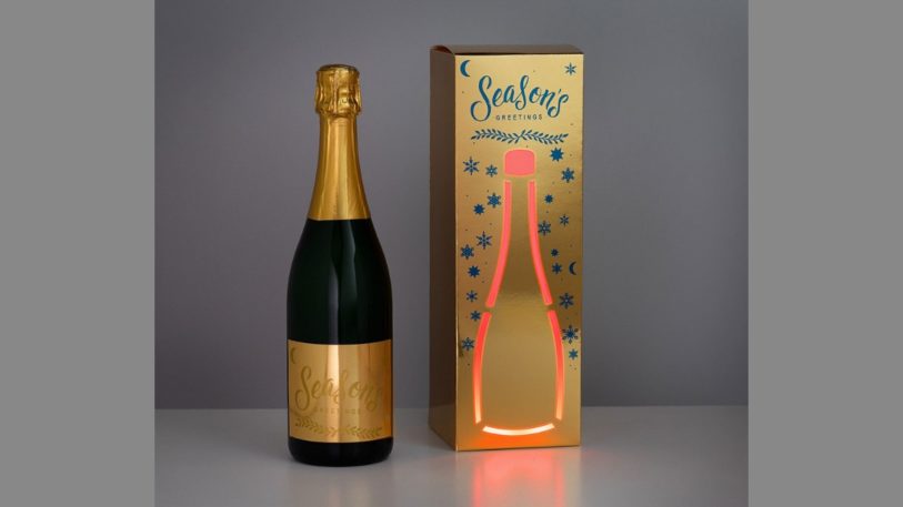 Champagner Verpackung leuchtet durch gedruckte Elektronik