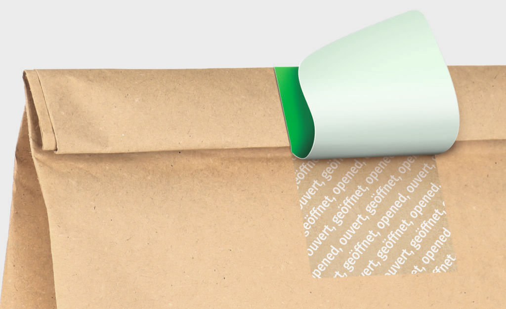 Kennzeichung eines geöffneten Meto-Etiketts auf einer Papiertüte