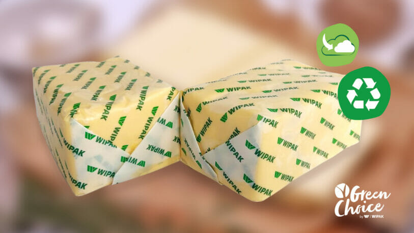 Picture of two pieces of butter in paper wrapping by Wipak.