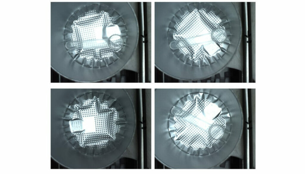 Four pictures of a tin packaging. There is a transparent spoon in three of the tins. Not in one can.