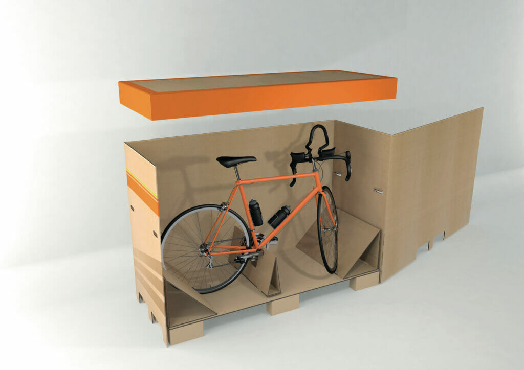 Picture of a bicycle in a corrugated cardboard transport box