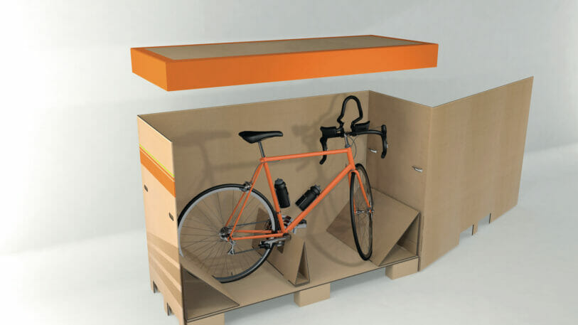 Bild von einem Fahrrad in einer Transportbox aus Wellpappe