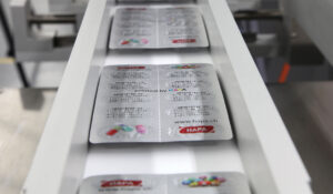 Picture of a production line with printed blister packaging.