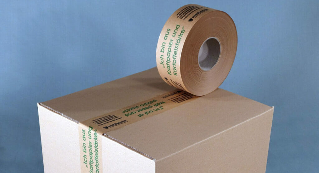 Bild von einem Versandkarton und einer Nasskleberolle