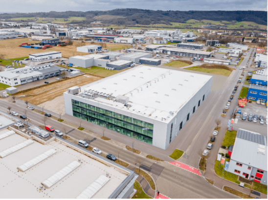 Luftaufnahme von einem Firmengebäude von Optima