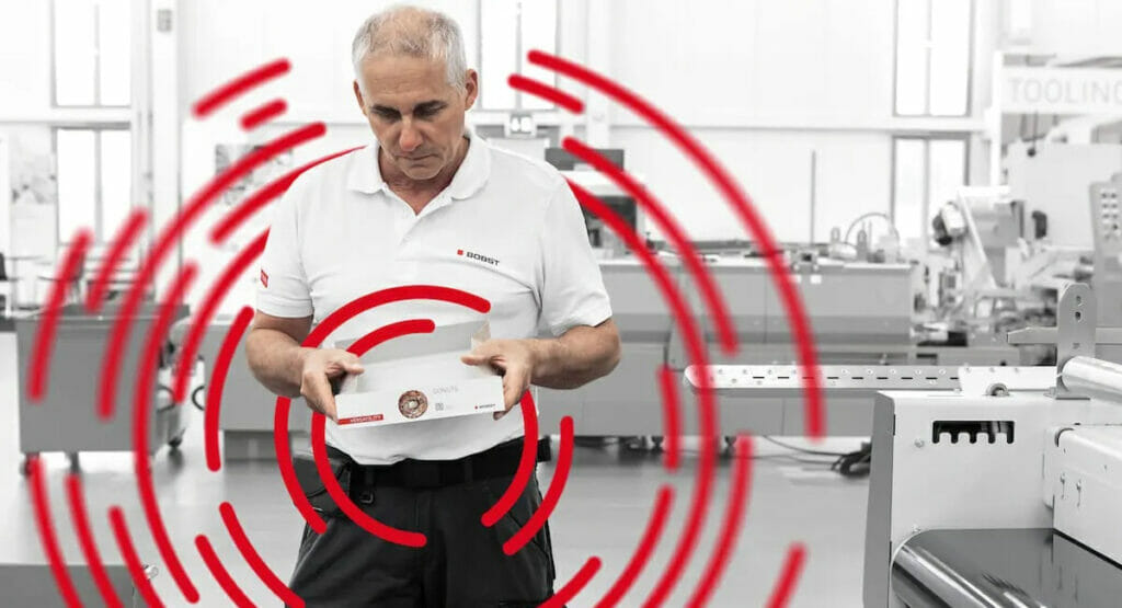 Picture of a man holding a connecting device