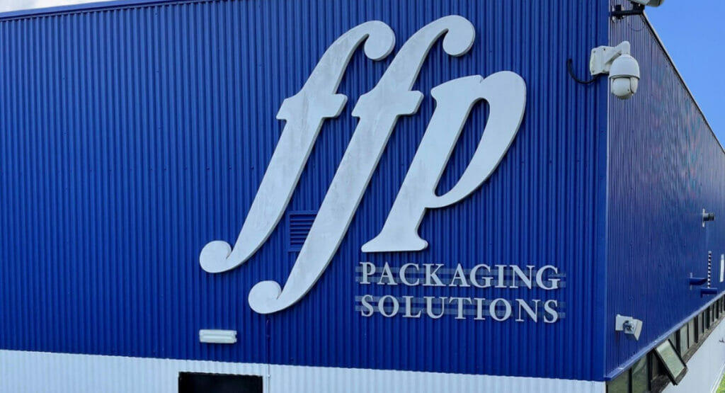 Image of a company building with the logo