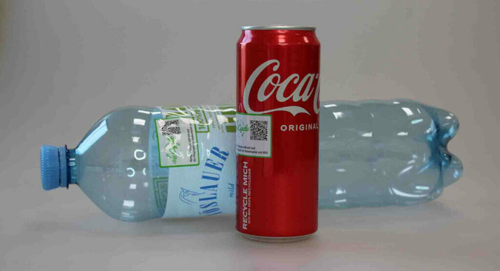 Image of a can and a bottle with labels