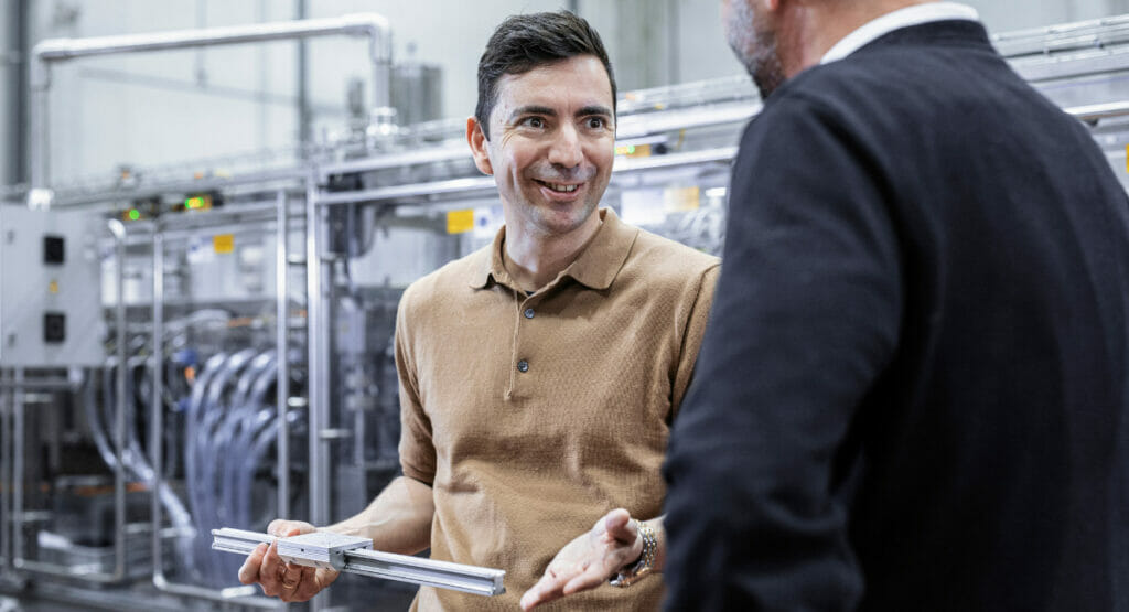 Picture of two men talking to each other