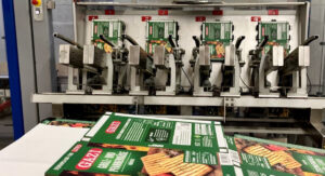 Vacuum is used when erecting the cartons and inserting the cheese packaging.