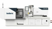 Die Kniehebel-Spritzgießmaschine Tederic NEO E230 wird bei der Herstellung von Visitenkartenboxen gezeigt